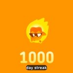 1000 days on Duolingo. Duo the owl is wearing sunglasses and is on fire, but seems to be fine.