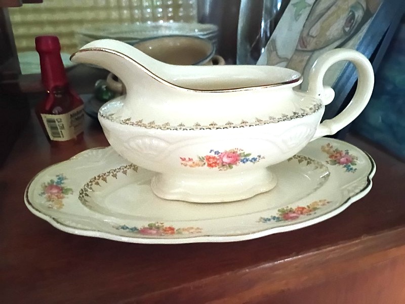 Ornate gravy boat, with serving dish